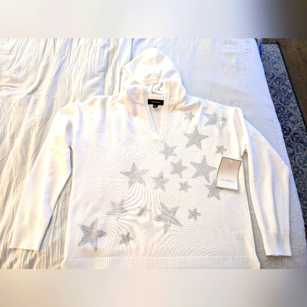 White hoodie with stars